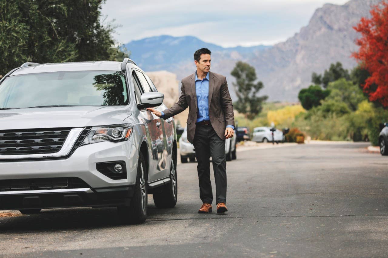 Man getting out of SUV