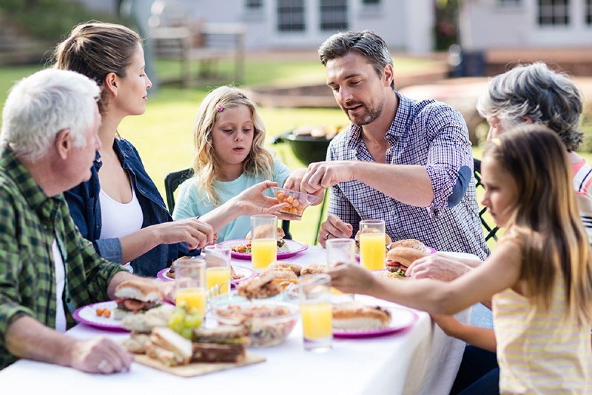 Family sharing a picnic in the park